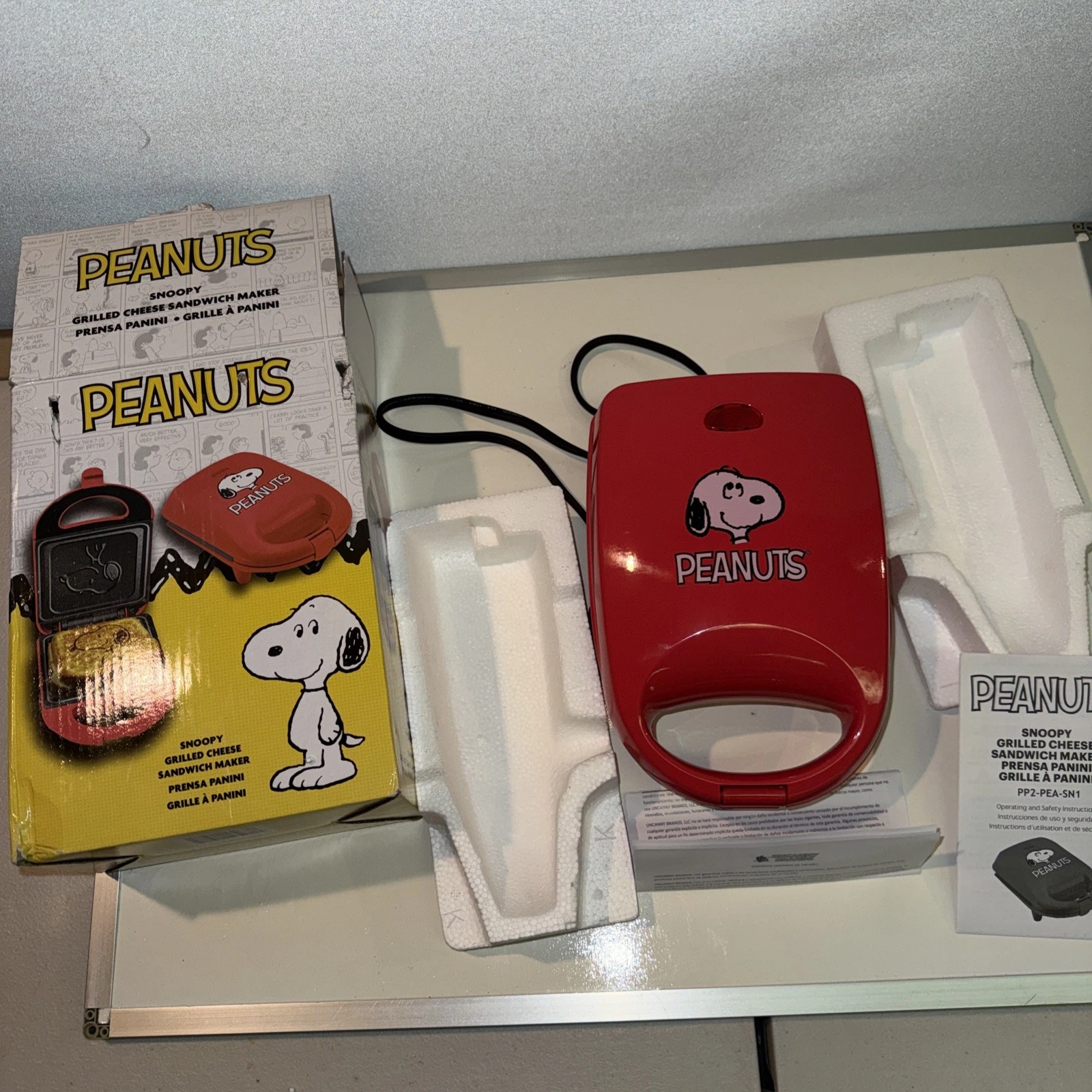 From “Peanuts” Grilled Cheese Sandwich Maker Snoopy New Open Box.