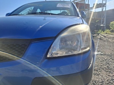 Used Left Headlight Assembly fits: 2009 Kia Rio clear outer signal lens Left Gra