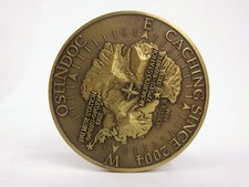 Geocaching OshnDoc - Family Matters Geocoin