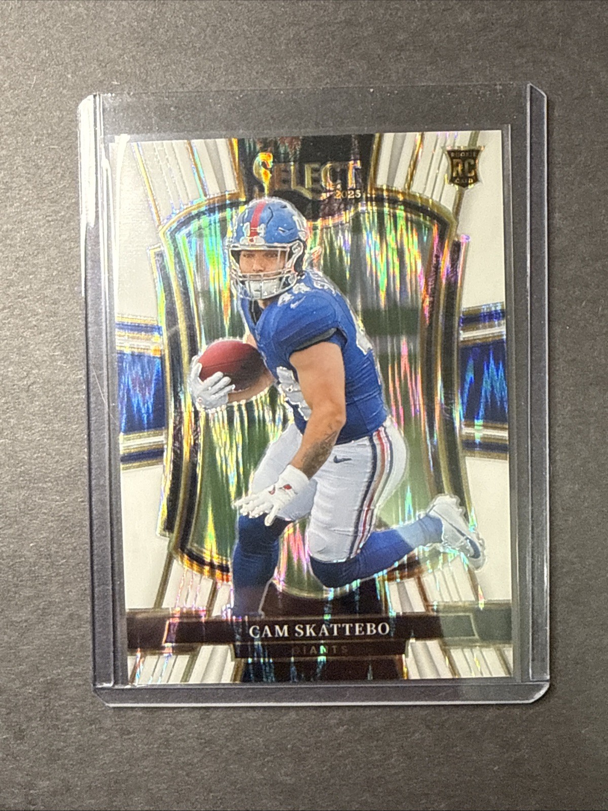 2025 Panini Select #195 Cam Skattebo White Prizm Shock #/799