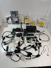 Large Set of Docking Stations, Cables, and Adapters