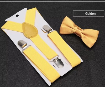 gold bow tie and braces