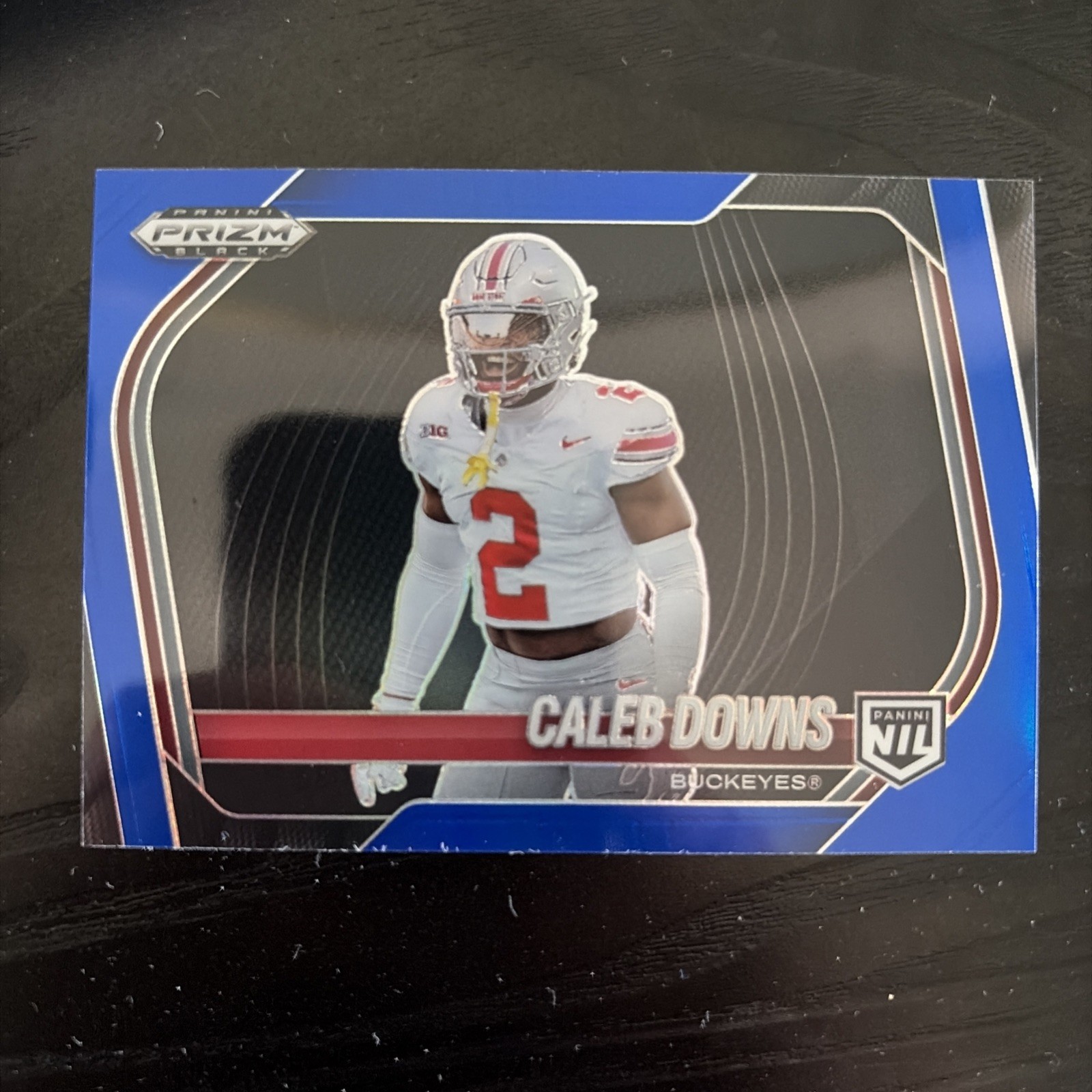 2025 Panini Prizm Black - Prospects Extended Caleb Downs #190 Blue Prizm /199