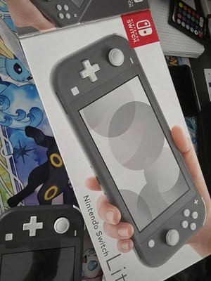 Nintendo Switch Lite OVP Grau Und 64 GB Micro SD Karte