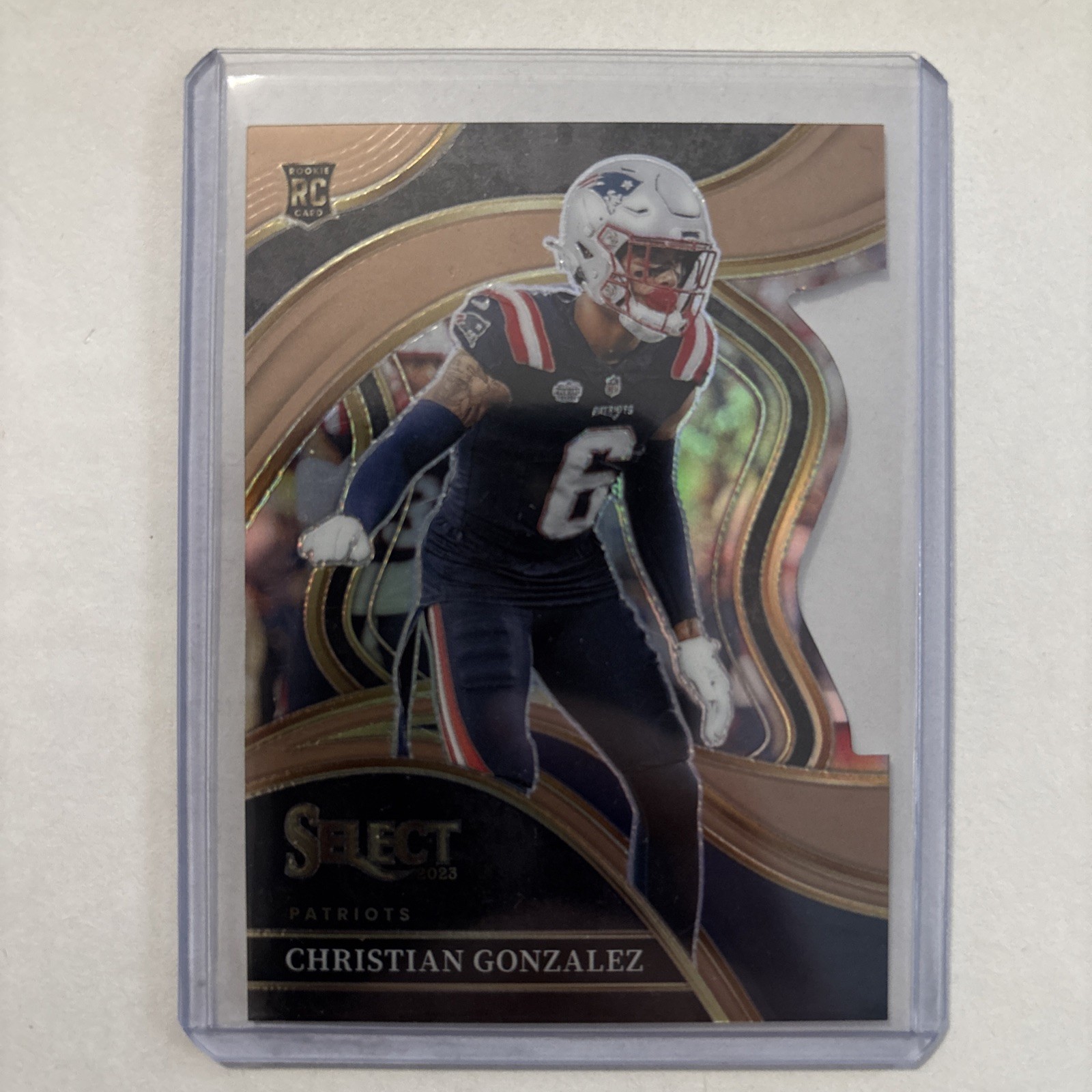 2023 Panini Select Christian Gonzalez Club Level Copper Die Cut Prizm RC /299
