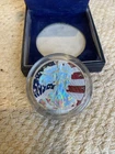 Vintage 2007 Silver Eagle Colorized hologram.