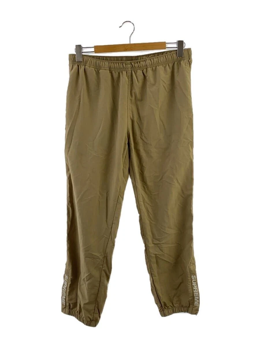 Pantalon d'échauffement Supreme Other Bottom M nylon camel occasion