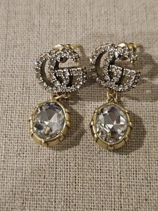 Boucles d'oreilles goutte cristal Gucci GG doré occasion avec boite et pochette accessoires