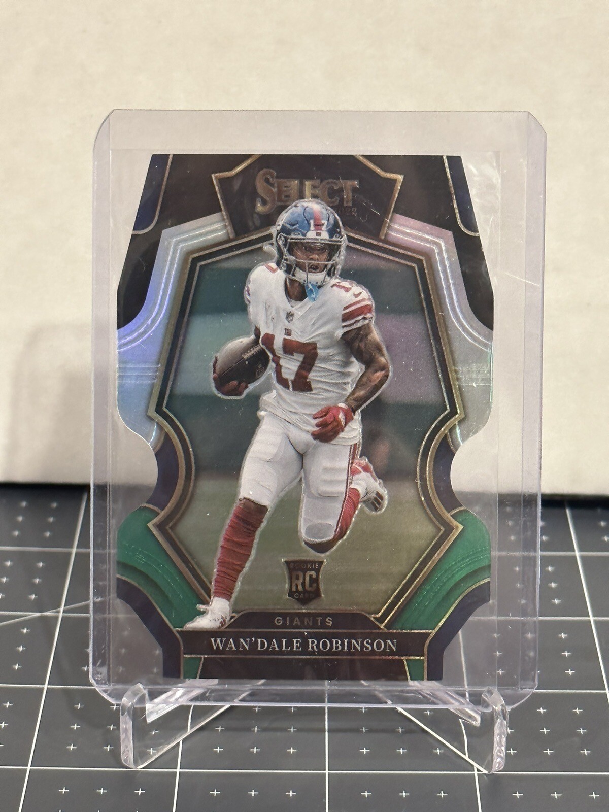2022 Select Football Wan’dale Robinson Premier Level Silver Prizm Die Cut #174