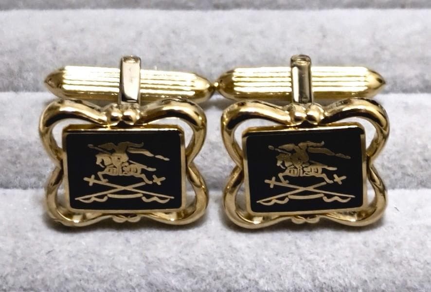 Vintage Burberry knight-horse logo tie clip and cuffs sourced from Japan — a rare find for the guy who wants understated designer cool without the department store markup.