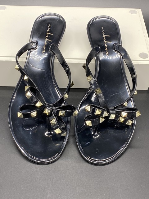 flip flops with studs and bow