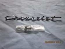 1957 chevy  chrome chevrolet dash script