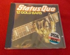 0A48. Status Quo - 12 Gold Bars CD.