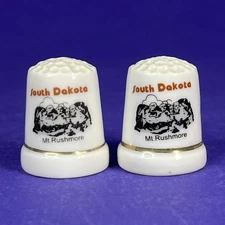 South Dakota Badlands Mt Rushmore Thimble Set of 2 Porcelain Unkown Maker