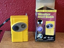 NOAA Weather Alert Radio tested & works perfect yellow in box (O25)