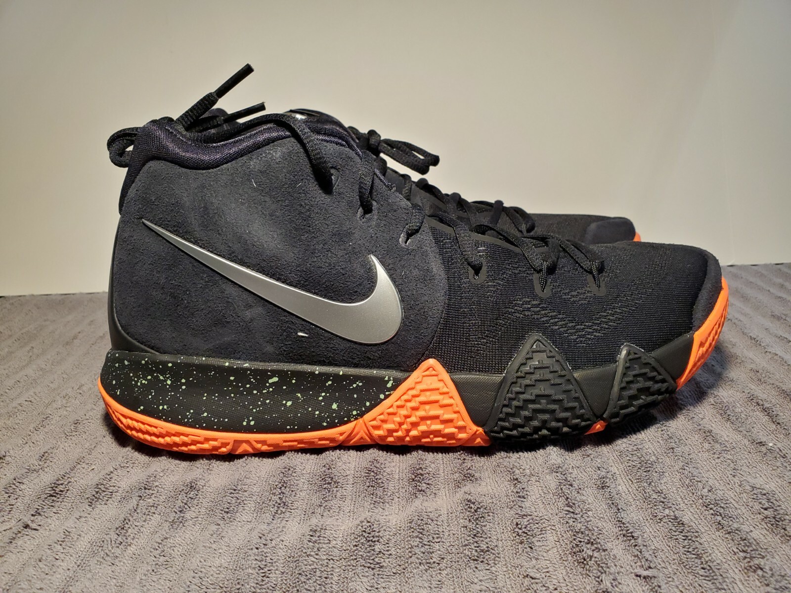 kyrie 4 black and orange