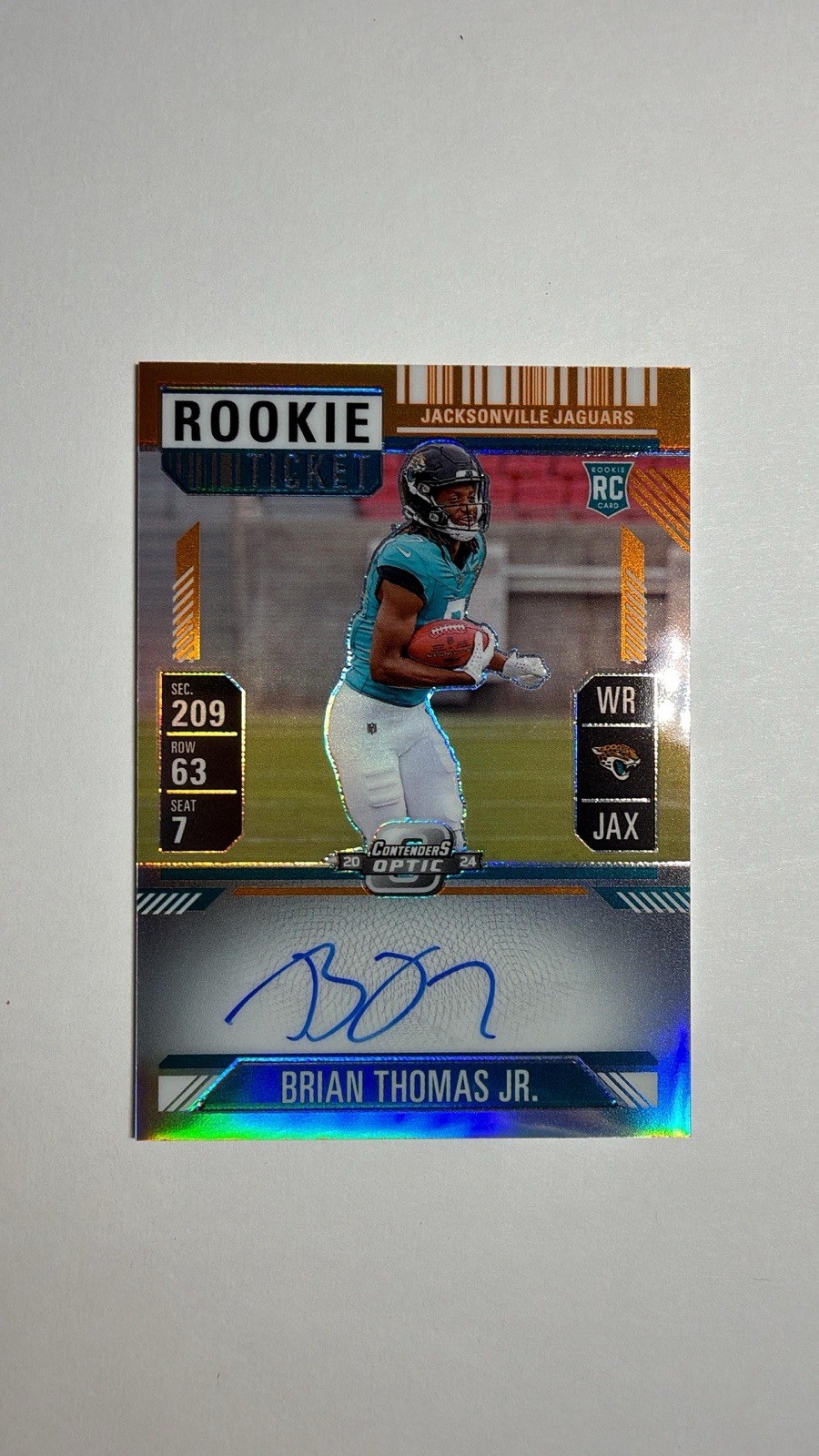 Brian Thomas Jr. 2024 Panini Contenders Optic Rookie Ticket Auto RC Orange /50