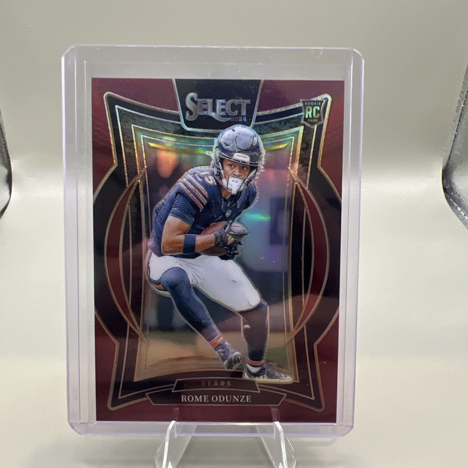 2024 Panini Select - Concourse Rome Odunze #3 Maroon Prizm /149 (RC)