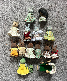 Assorted sylvanian families. Brown rabbit frog hedgehog grey rabbit cat.