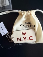 COACH DOUBLE SIDED Hang Tag Bag Charm White Red Leather with dinosaur motif