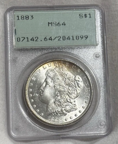 1883 Morgan Silver Dollar, Old Green Rattler PCGS OGH, MS-64 Light Rim Toning
