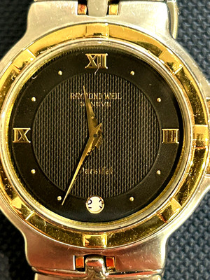 Raymond Weil Watch.  This vintage watch has been sized, but never worn.