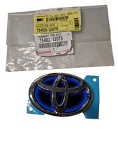 STEMMA FREGIO LOGO ANTERIORE PER TOYOTA Corolla Serie (18>) 75403-12070 Benzina