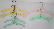 Vintage Mother Goose Train Plastic Swivel Baby Hangers Lot of 6