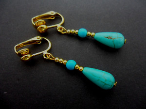Authentic A PAIR OF TURQUOISE BLUE GOLD PLATED DANGLY TEARDROP CLIP ON EARRINGS. .