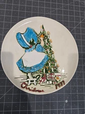Christmas 1977 Byron molds plate with tree and girl. Hand painted