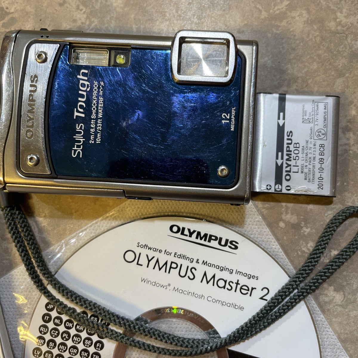 Olympus STYLUS TOUGH 8000 Digital Camera W/ Battery & Manual Olympus STYLUS TOUGH 8000 Digital Camera W/ Battery & Manual