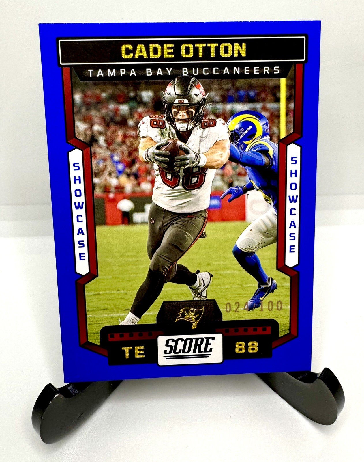 2023 Panini Score #66 Cade Otton Blue Showcase Parallel #'d 24/100