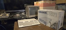 Commodore 128 Personal Computer With 1571 Disk Drive And Commodore Model 1902a