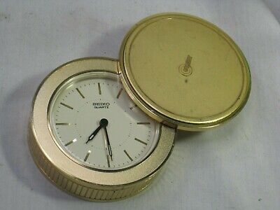 vintage Target SEIKO Quartz Japan unique clock folding puck vintage Target SEIKO Quartz Japan unique clock folding puck