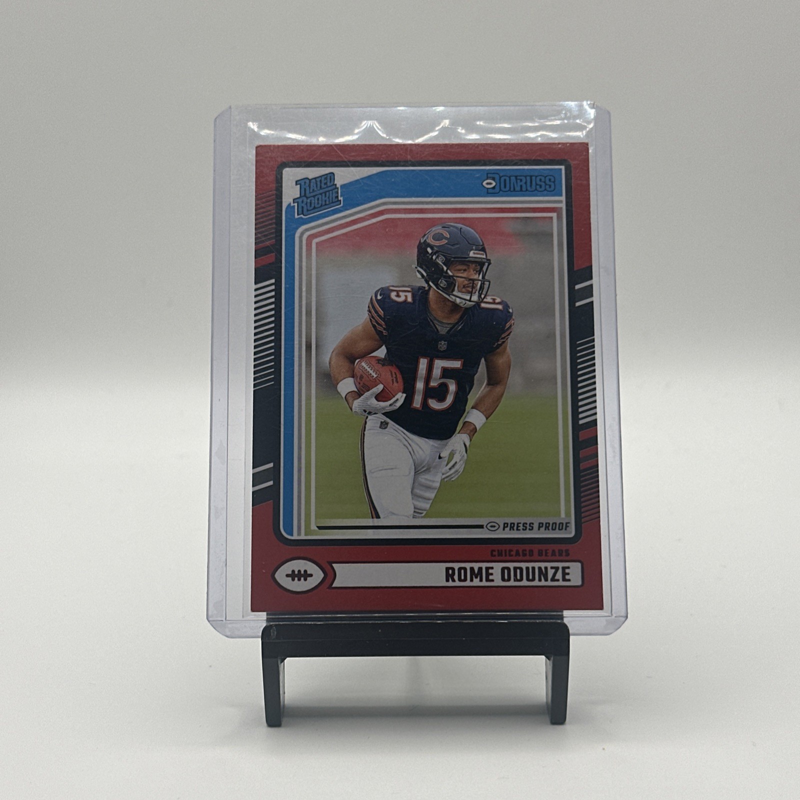 2024 Panini Donruss - Rated Rookie Rome Odunze #309 Press Proof Red (RC)