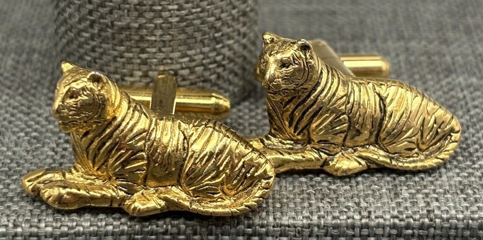 Gold-tone figural tiger/cat cufflinks that are bold, sculptural, and wildly expressive — the kind of vintage men's accessory that makes a suit unforgettable.