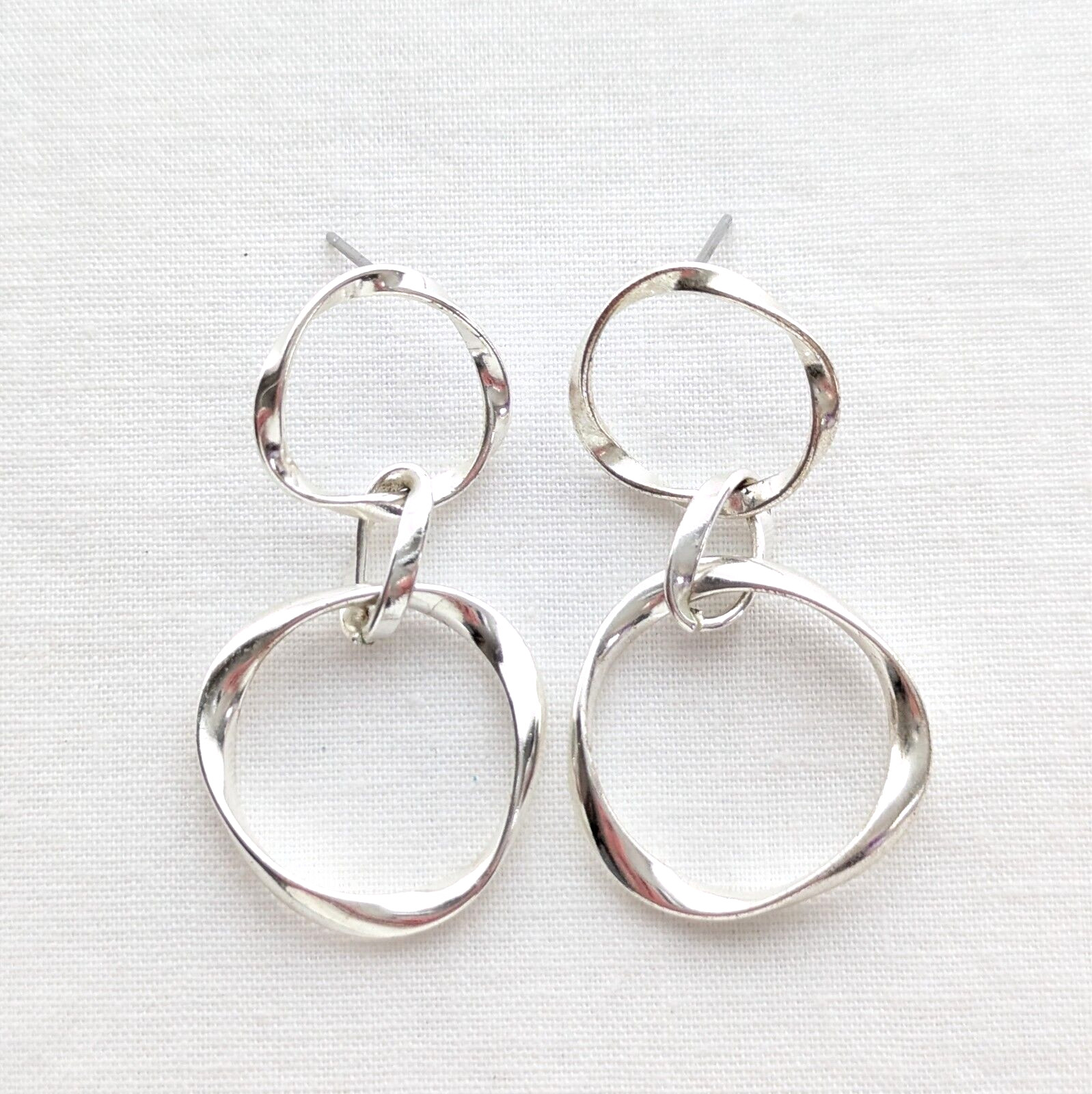 Interlocking Twisted Hoop Dangle Earrings Silver … - image 1