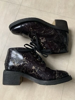 Boots Chanel Cuir Noir Doré - Photo 1/4
