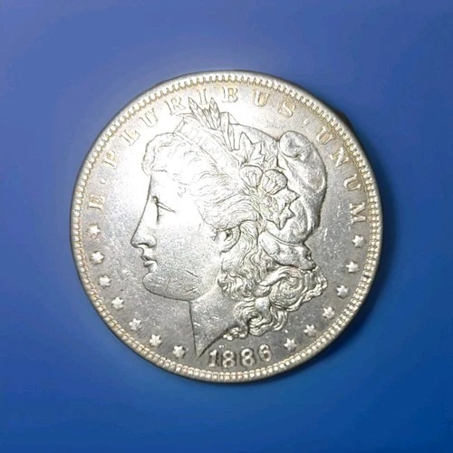 1886 MORGAN SILVER $1 VG/F CONDITION