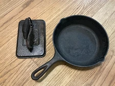 Lodge cast iron skillet (8") and press, lot of 2