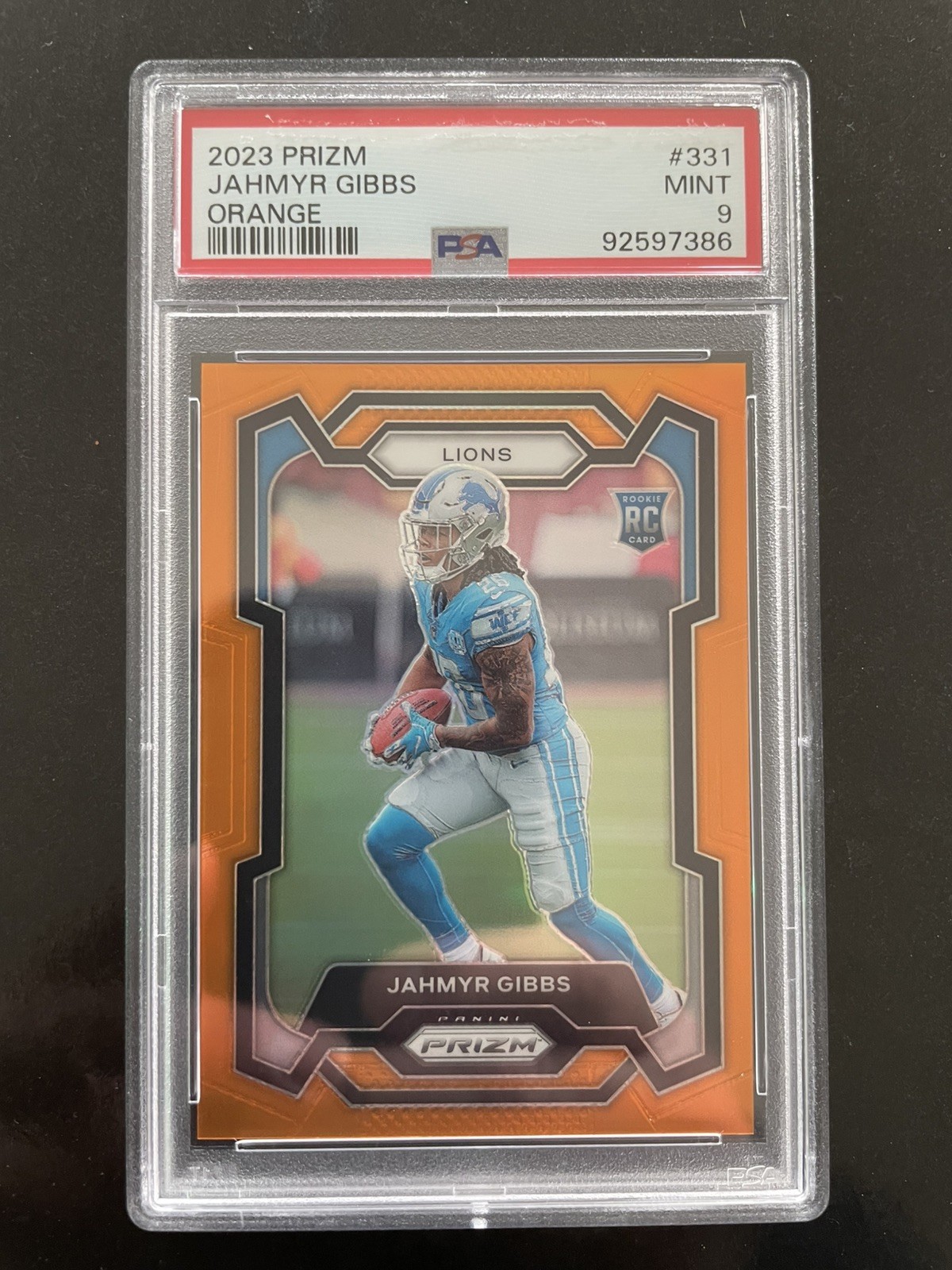 2023 Panini Prizm Jahmyr Gibbs #331 Orange Prizm 128/249 (RC) PSA 9
