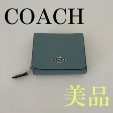 Final price Good condition COACH Coach tri-fold wallet light blue