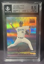 1999 SKYBOX PREMIUM STAR RUBIES PARALLEL #86 LIVAN HERNANDEZ SP #/50 BGS 8.5 SP