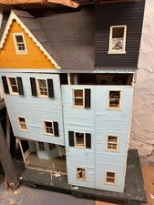 Collectible doll house.7 rooms. Partially wired for electricity