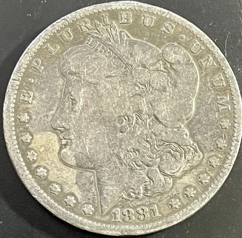 1881 O $1 Morgan Silver Dollar. 90% Silver. #1679