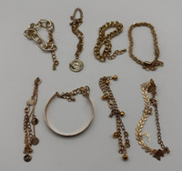 The Eight Piece Stunning Matching Goldtone Bracelets Collection Love/ Coin/Rope