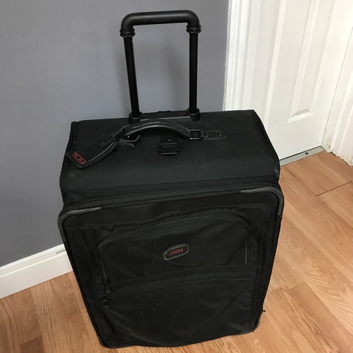 Tumi Black Canvas Rolling Suitcase 