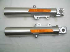 Pair Of Stock OEM Lower Fork Sliders - NEW TA...