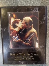 Autographed photo of Nana Visitor (Maj Kira) and Rene Auberjonois (Odo) kissing