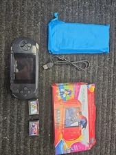 PXP3 Slim Station Handheld Console 2 cartridge games 